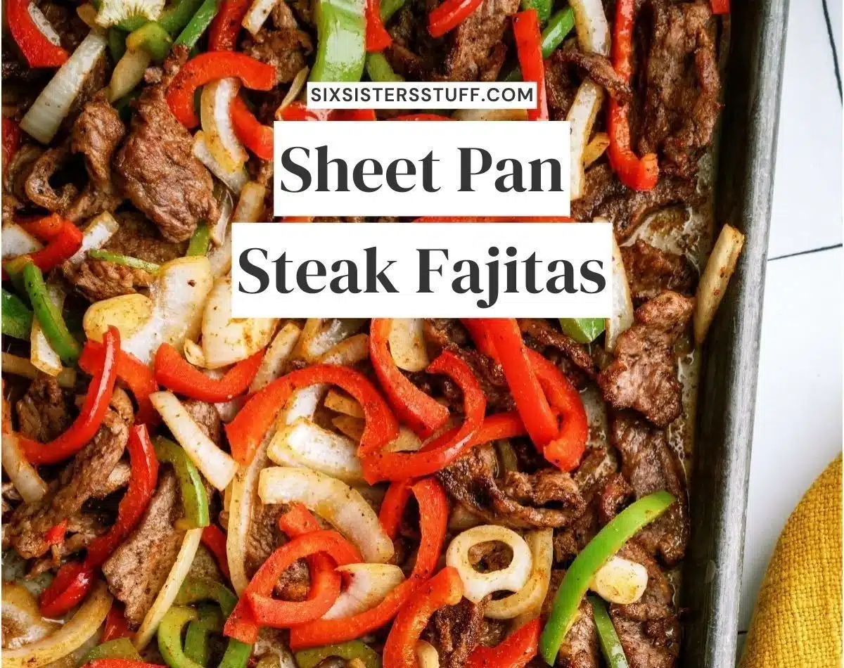 Colorful sheet pan steak fajitas with peppers and onions