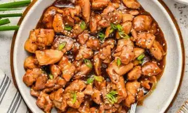 Stir Fried Bourbon Chicken ready to serve, glazed with bourbon sauce and vegetables